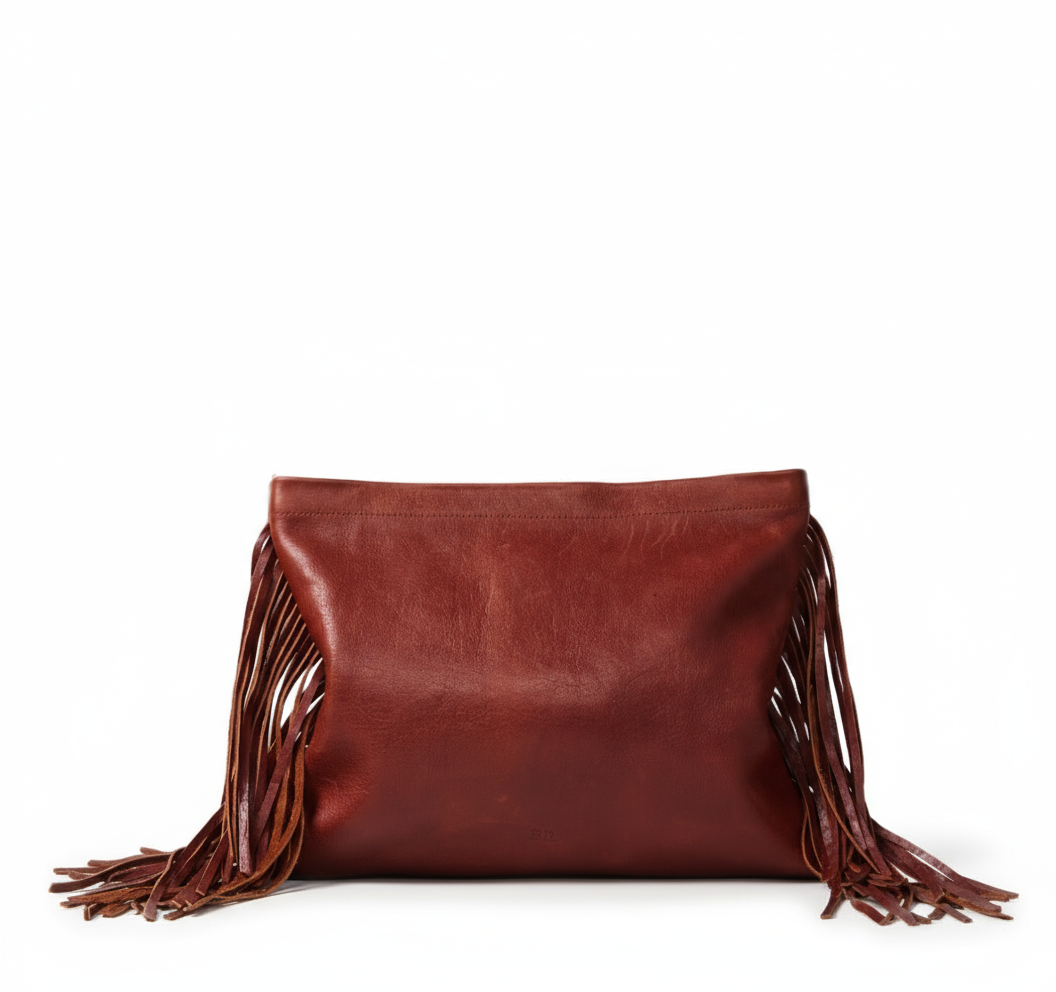 Brown leather clutch bag with fringe created from sustainably sourced materials