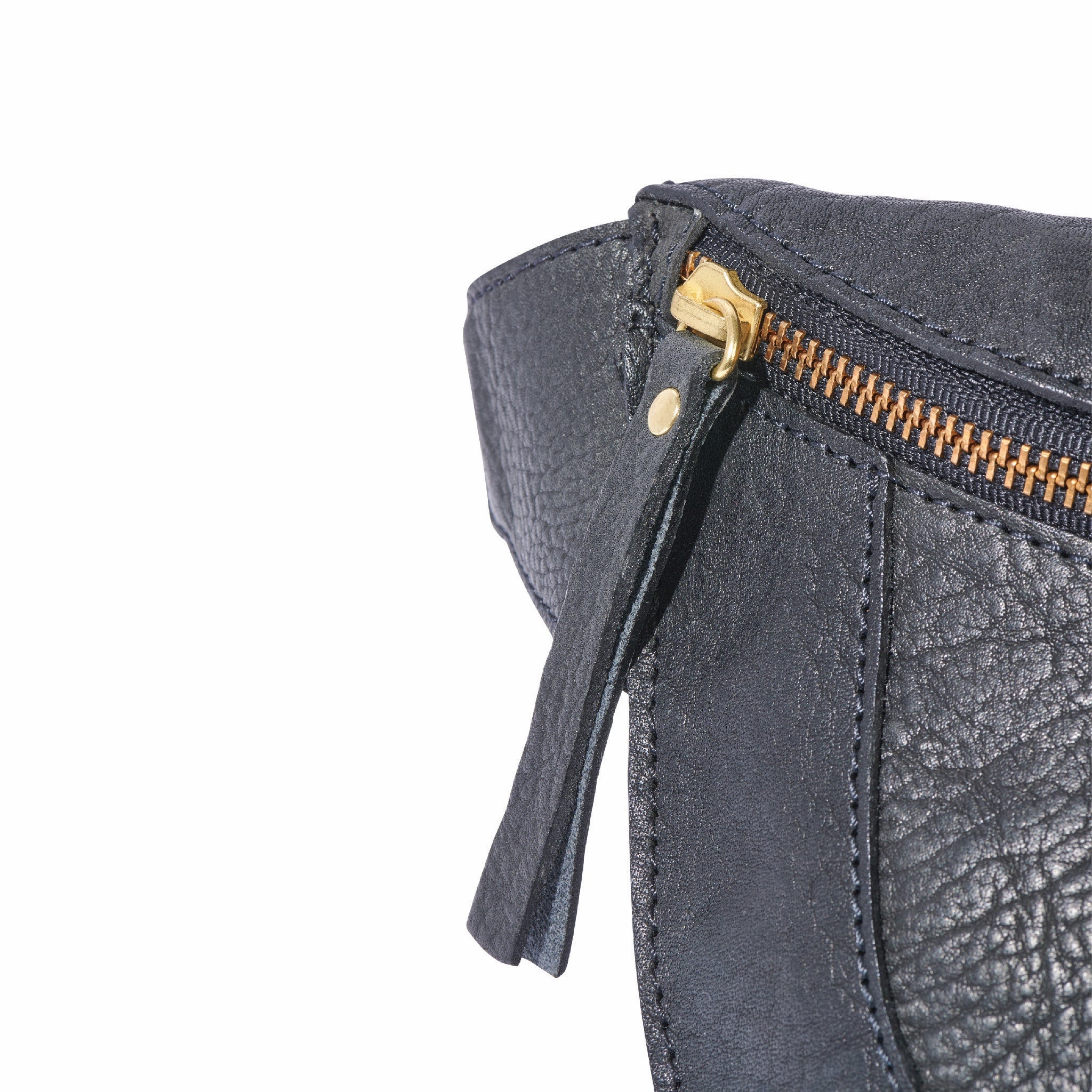 Black leather belt bag worn at waist, shoulder, or crossbody for versatile styling