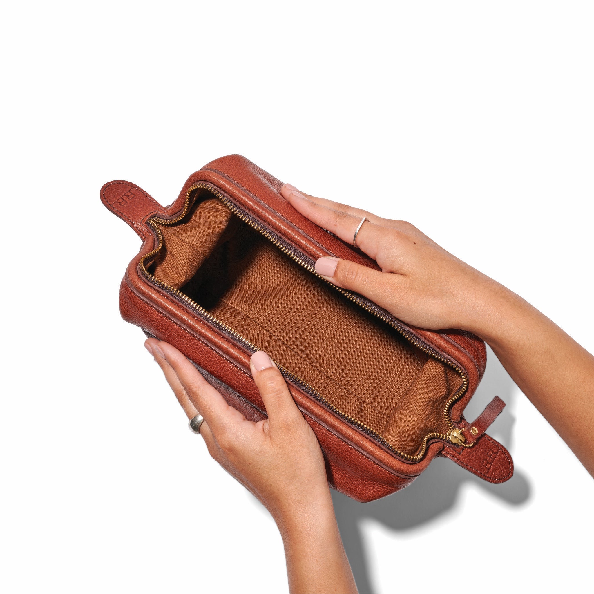 Interior view of Range Revolution toiletry bag with lined compartments