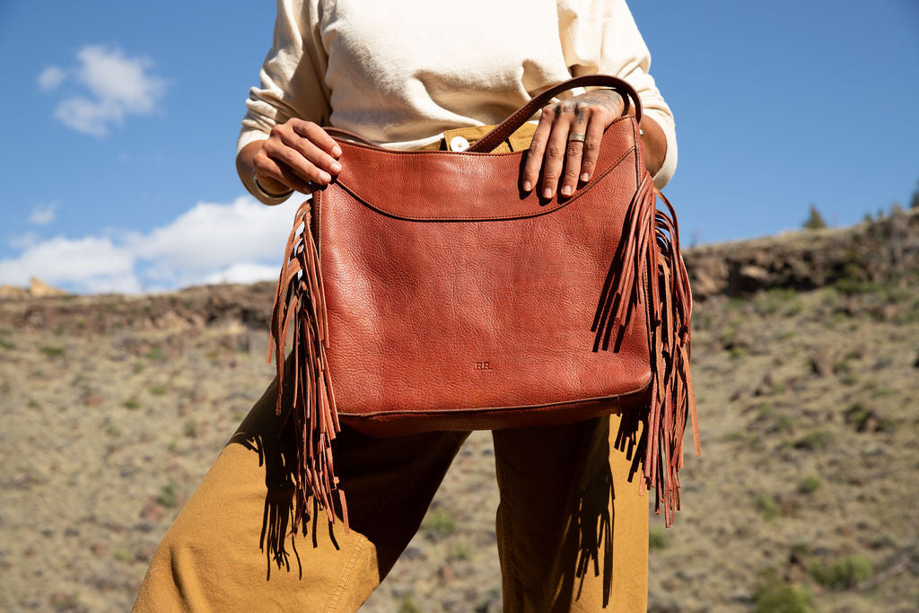 Fringe Hobo Bag in brown leather with long western fringe and brass accents