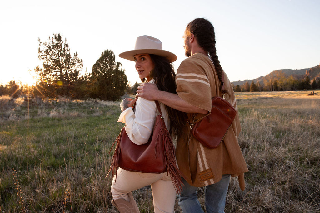 Fringe Hobo Bag in brown leather with long western fringe and brass accents