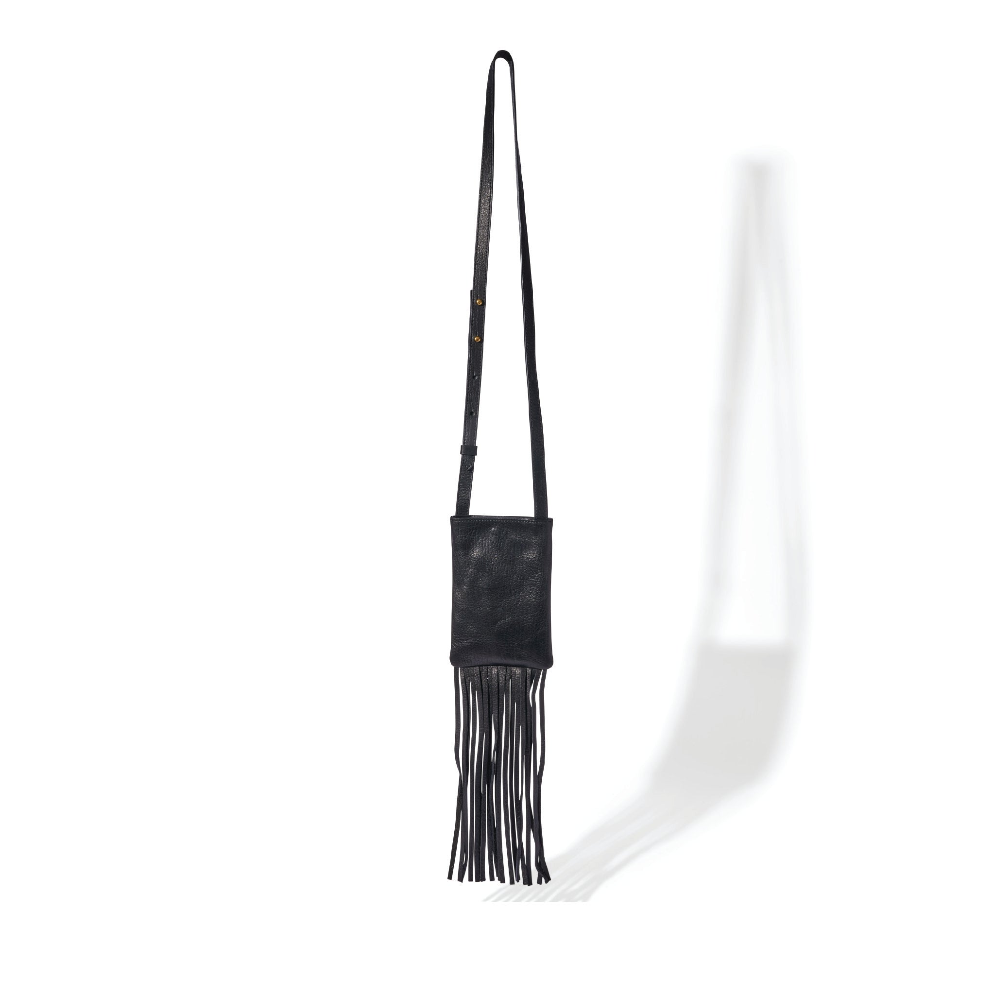 Fringe Phone Bag in black leather with long fringe and magnetic snap closure