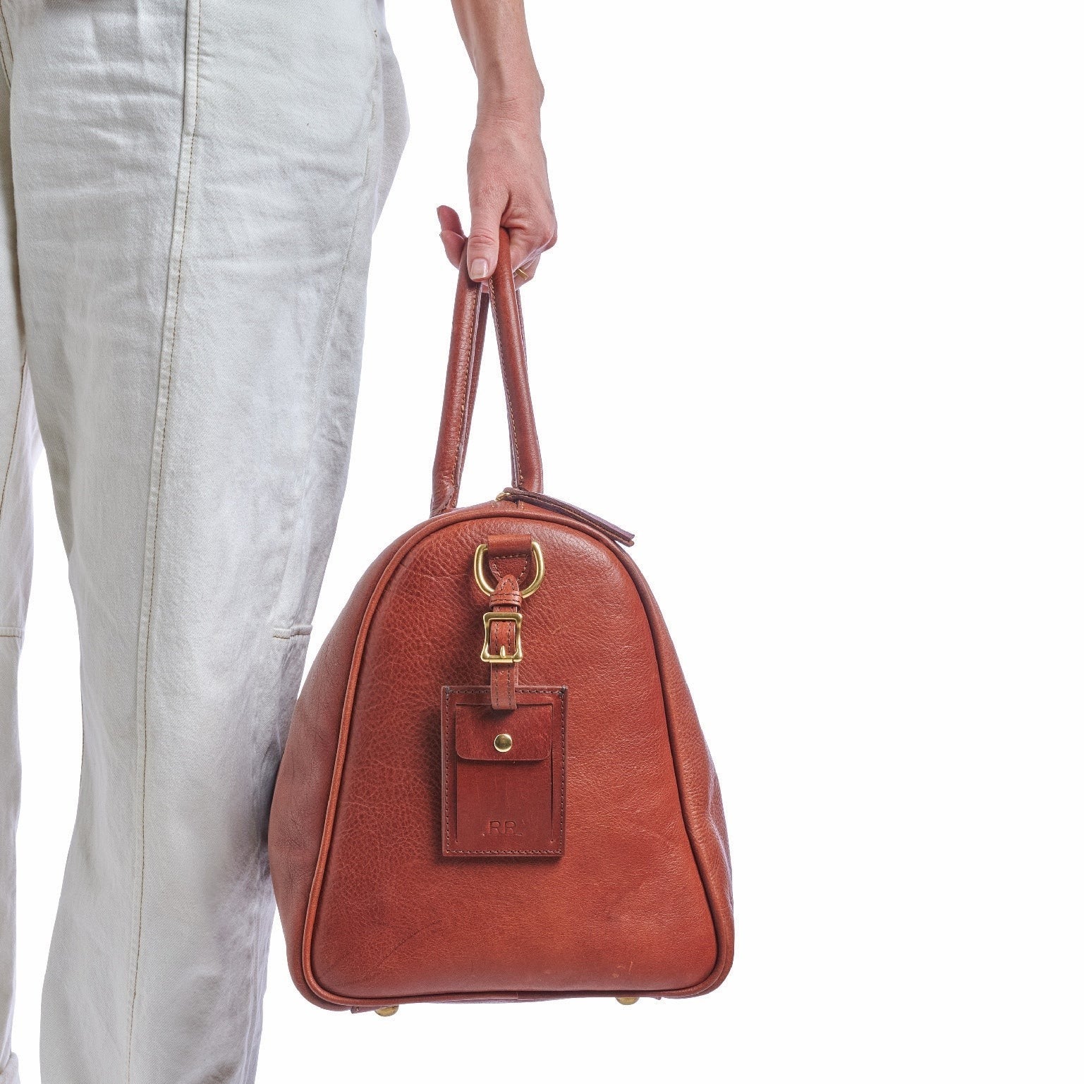 Mahogany brown leather Luggage Tag crafted from vegetable-tanned regenerative leather