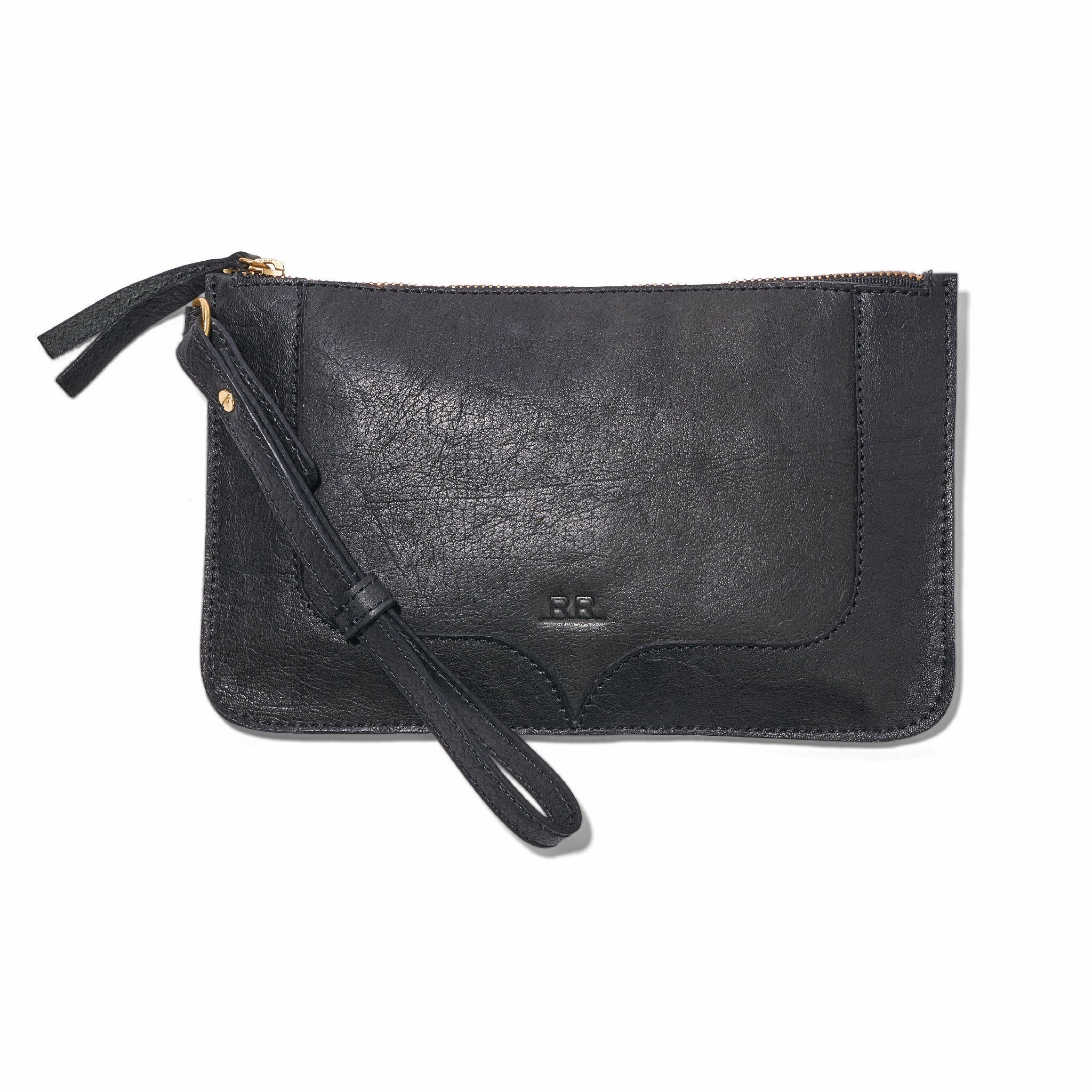 Regenerative leather wristlet used as travel tech and essentials organizer.