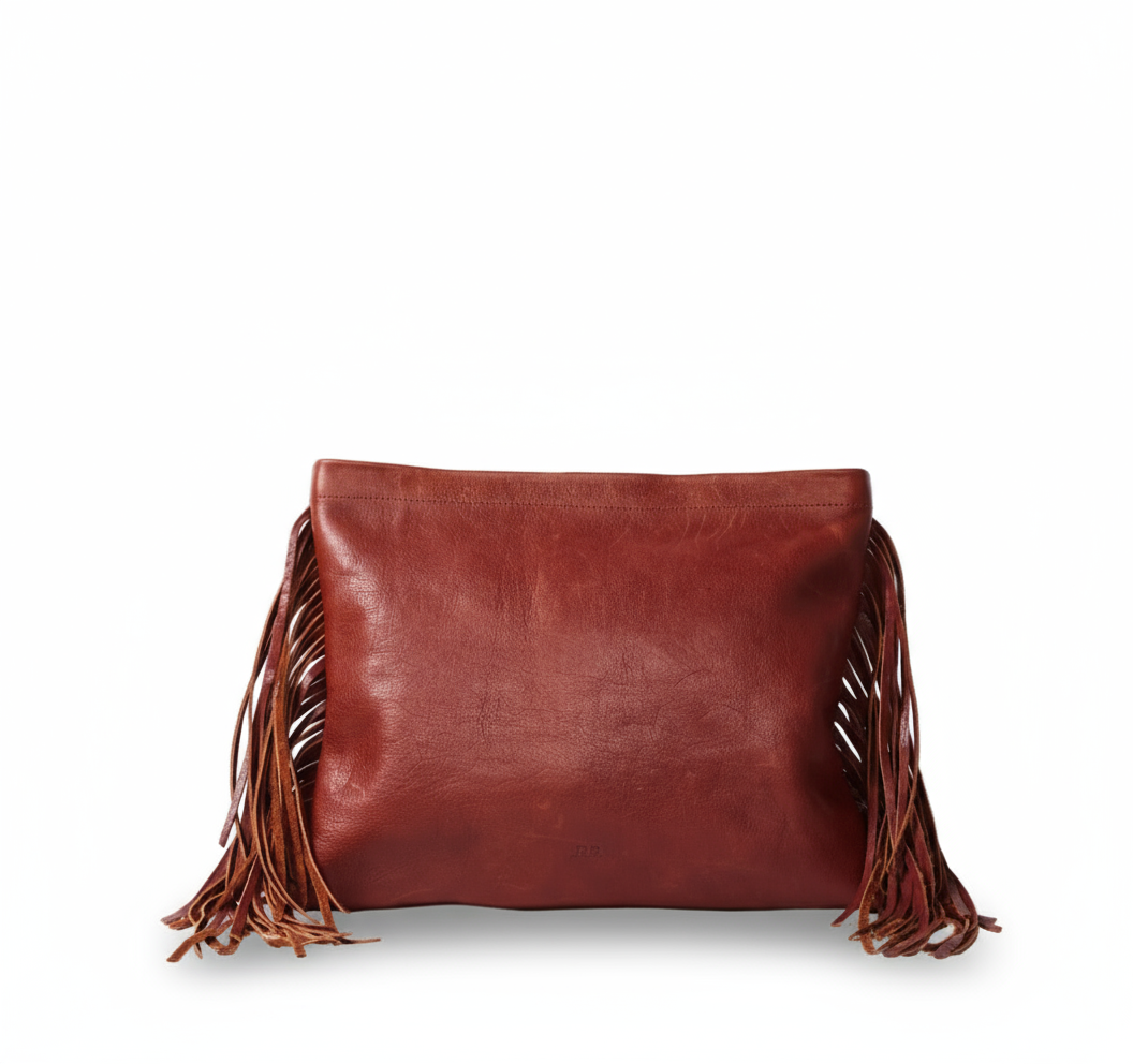 Brown leather clutch bag with fringe created from sustainably sourced materials